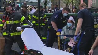 Woman shoved onto subway tracks in Times Square