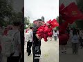 why people throwing red cloth in bowl
