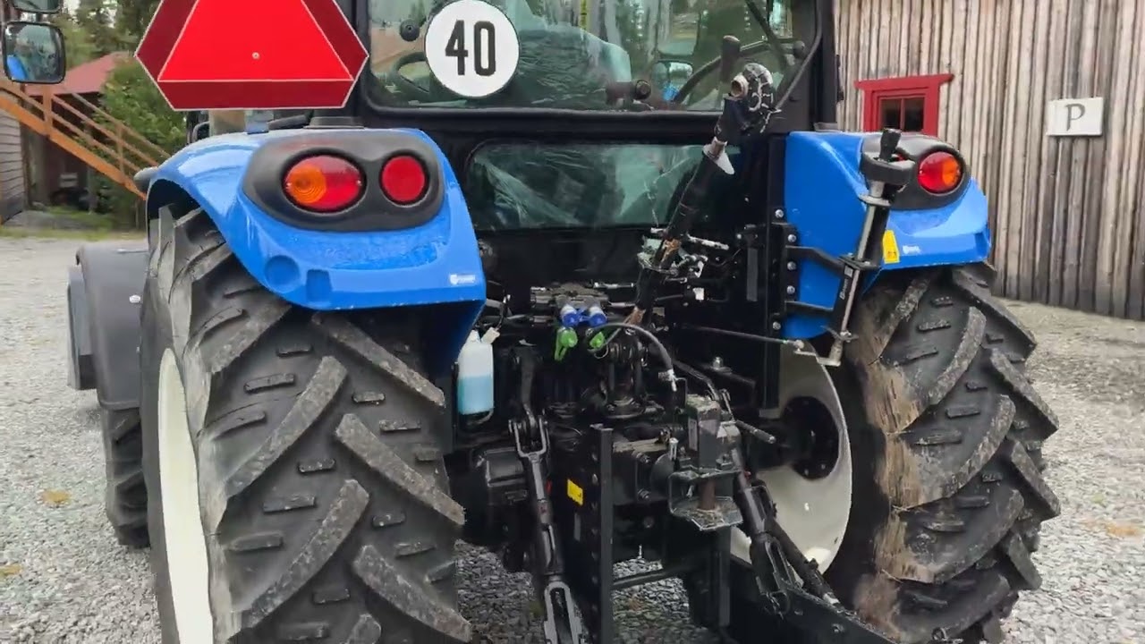 Traktor med frontlastare New Holland