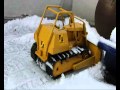 tonka bulldozer und zil 130 RC snow plow.wmv