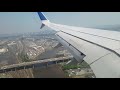 Boeing 737-800 Landing in Newark with New York City View.  UHD / 4K