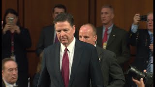 Comey pleads not guilty as trial date set