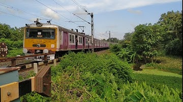 katwa - howrah local train passing out behula rail gate..