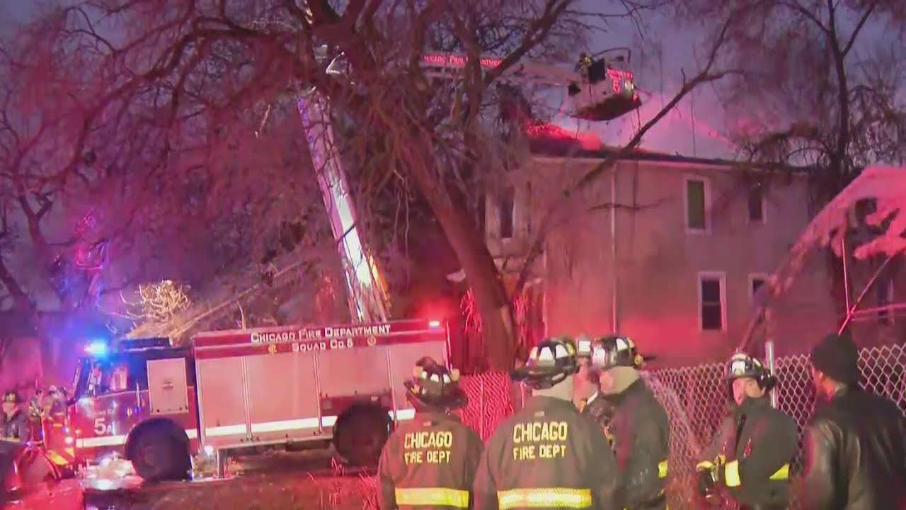 Fire crews battle blaze at vacant building in Fuller Park - YouTube