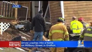 Car slams into home in Grafton
