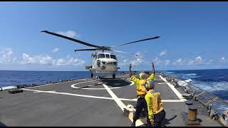 SH-60 Seahawk helicopter Landing on USS John S McCain.