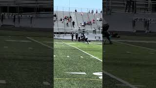 5-star receiver Jamier Brown makes a snag in the end zone during one-on-one drills at a camp