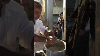 Ginger chai tea freshly made to order by street vendor - Dwarka, India.  youtubeshorts shortsvideo