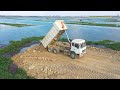 Bulldozer & Dump Trucks working - Dongfeng dump trucks unloading soil & Shantui bulldozer push soil