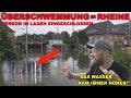 [PERSON IM LADEN VOLL WASSER] BAGGER GEHT BEINAH IM WASSER UNTER | HOCHWASSER IN RHEINE - TIEF BERND