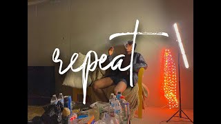 repeat (lyrics + visualizer)