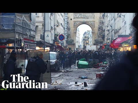 Clashes erupt with French police outside scene of deadly shooting in Paris