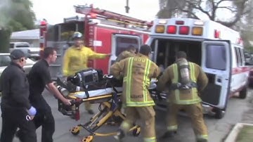 Firefighters Rescue Man From Burning House (Helmet Cam)