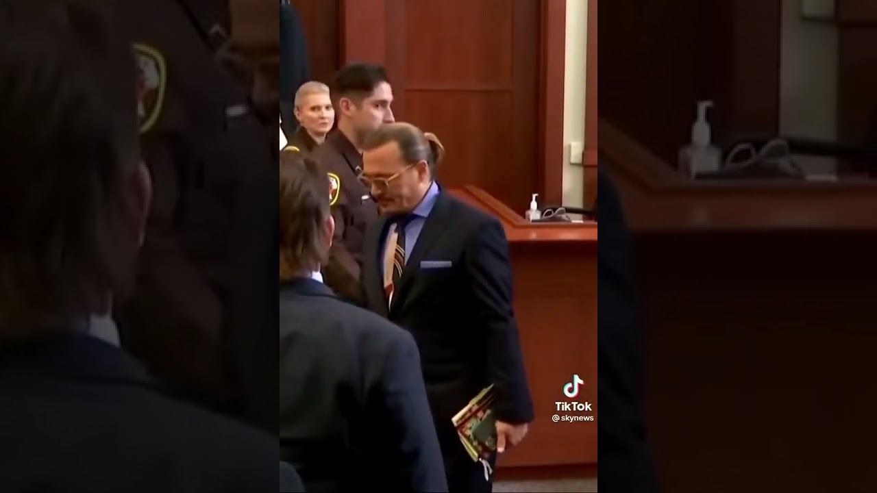 Amber heard flinches in court as Johnny Depp approaches her