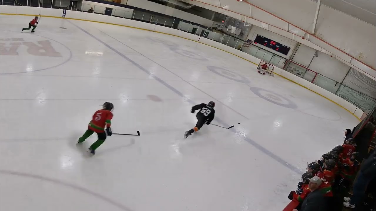 Brody chases the puck into the zone and Rorey goes short side on the goalie