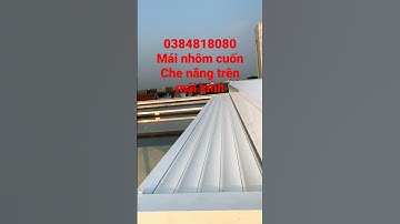mái nhôm cuốn tự động che nắng trên mái kính