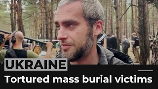 Ukrainian president says some mass burial victims were tortured
