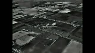 Apache helicopters engaging a building with a possible weapon cache.