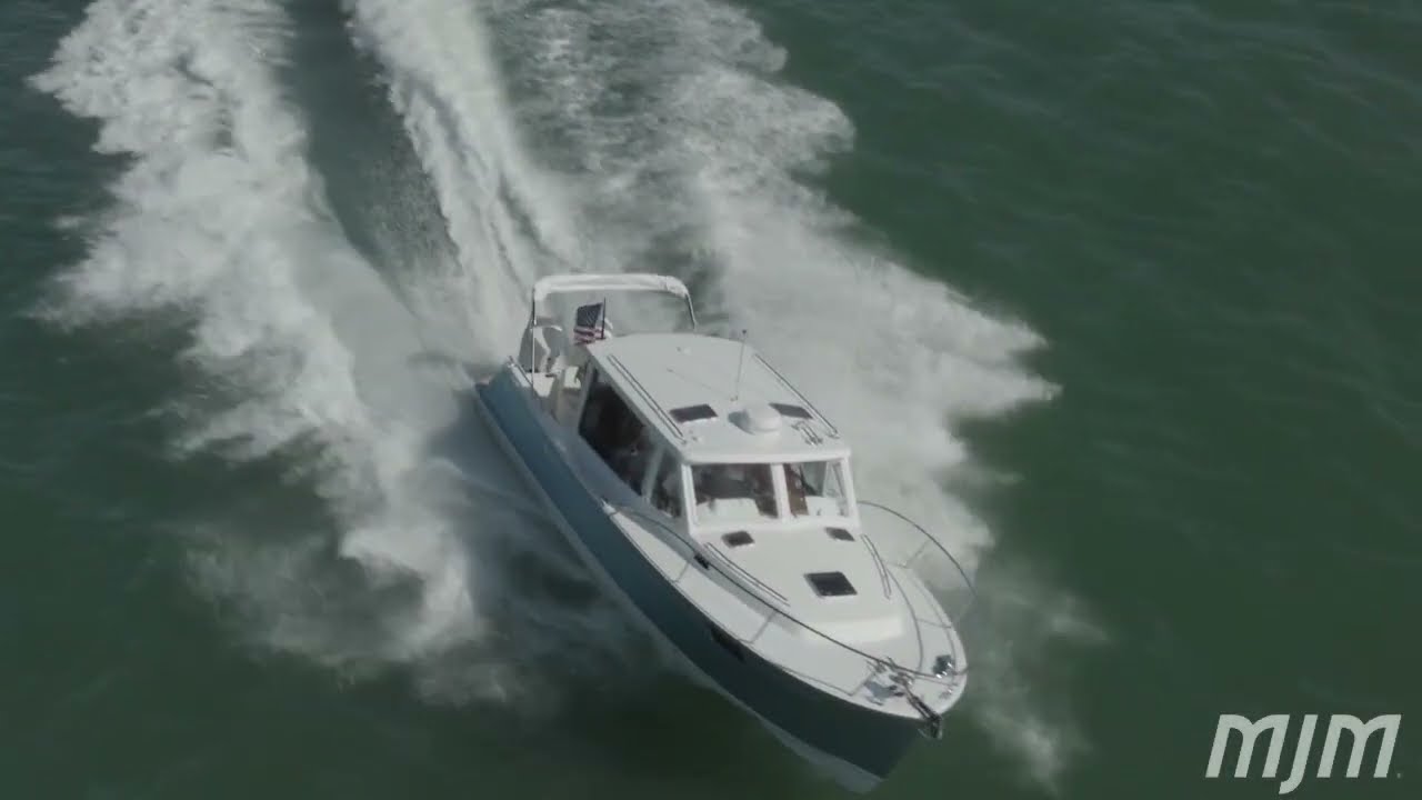 2025 MJM 35 In Stock. Flag Blue with Mercury 400s and SeaKeeper.