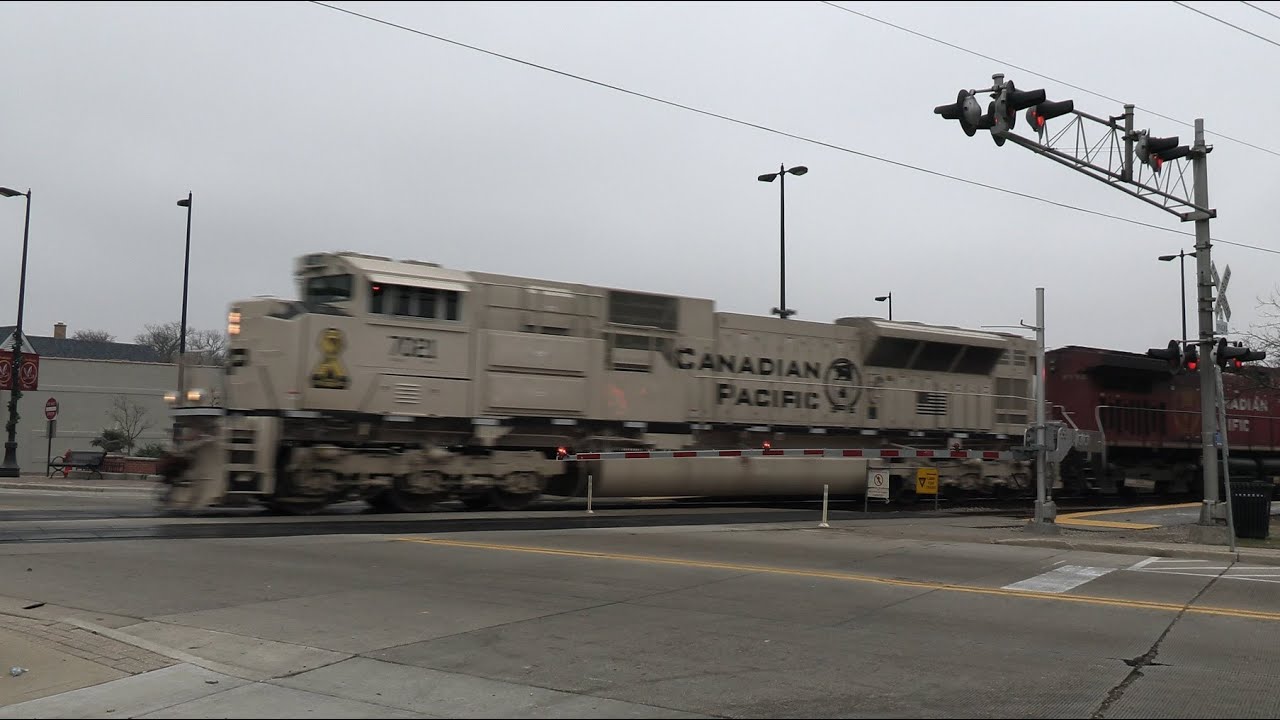 Canadian Pacific's Arid Region Armed Forces Tribute Unit leads 199 at Northbrook