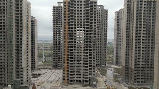 China's property market crisis: Homeowners forced to live in unfinished apartments • FRANCE 24