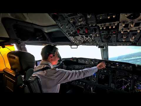 Pilot Cockpit View during landing at Amsterdam Airport - turbulence - Boeing 737