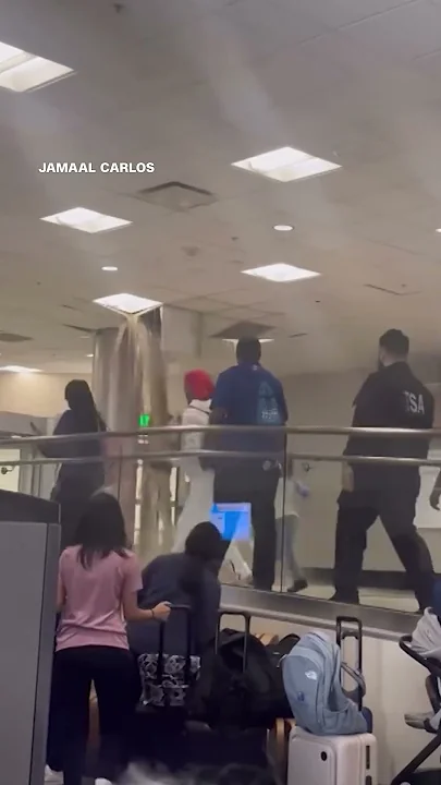 Brown water leaks from Atlanta airport ceiling