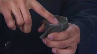 Coin through solid rubber