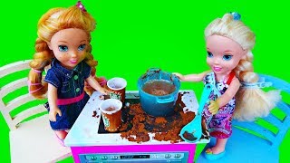 Elsa and Anna toddlers cooking and playing restaurants