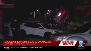 Car flipped on its side after 3-vehicle crash