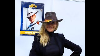 ALISON DOODY ('Elsa Schneider') signs Indiana Jones fedora for charity (signed by Ford & Spielberg)
