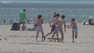 Beachgoers are soaking up the sunshine after a long winter screenshot 5