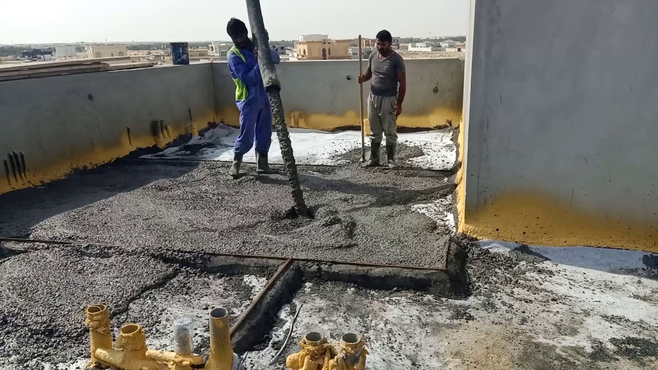concrete screed work is going on roof waterproofing