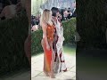 Kris Jenner and Kim Kardashian pose together at the #MetGala.