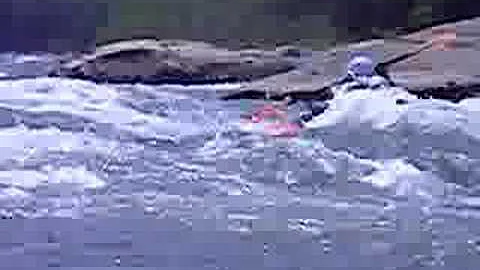 Erica styling on a wave on the Tygart River