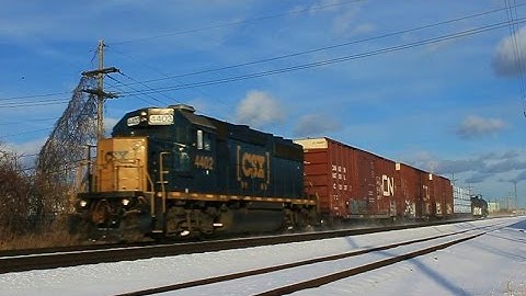 CSX GP40-2 heads west through Livonia w/ CSX Local D738