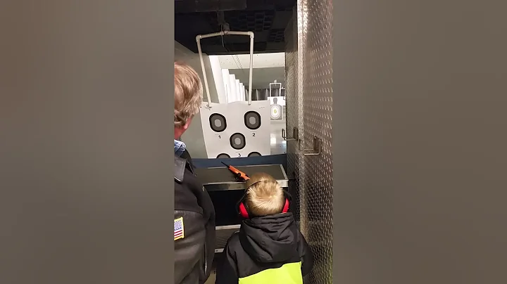 Connor shooting for first time with dad and grandpa