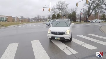 Cyclist Catches Head-On Collision With Car On Camera
