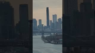 "A Breathtaking Perspective: East River Majesty from Manhattan's 38th Floor"