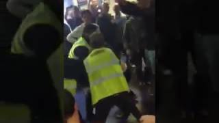 Stewards punch Stone Roses fan in the ribs!