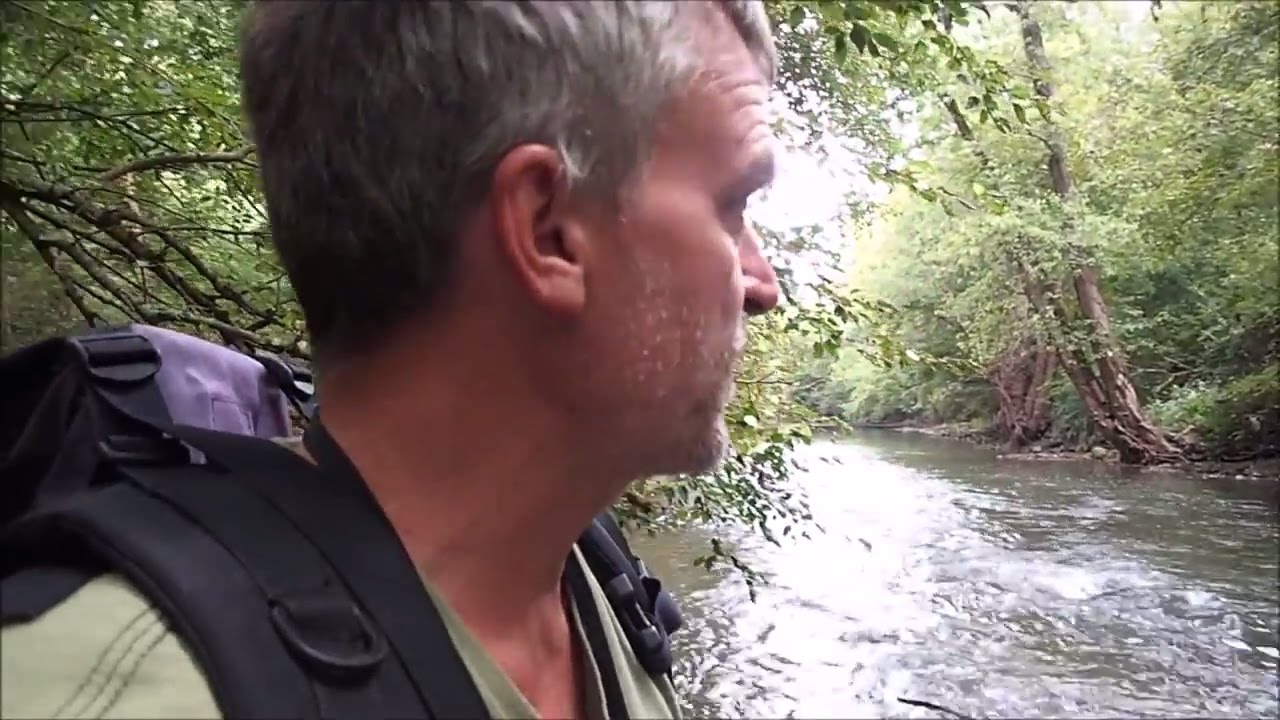 Collecting Bottles From The River