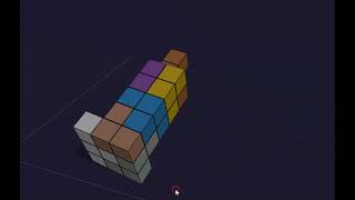 Tower figure made of pieces of Soma Cube puzzle