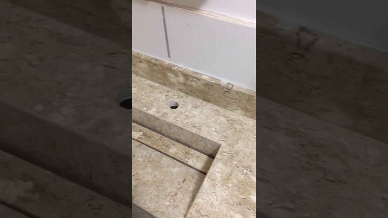 Mármore Bege Bahia com cuba esculpida e válvula oculta