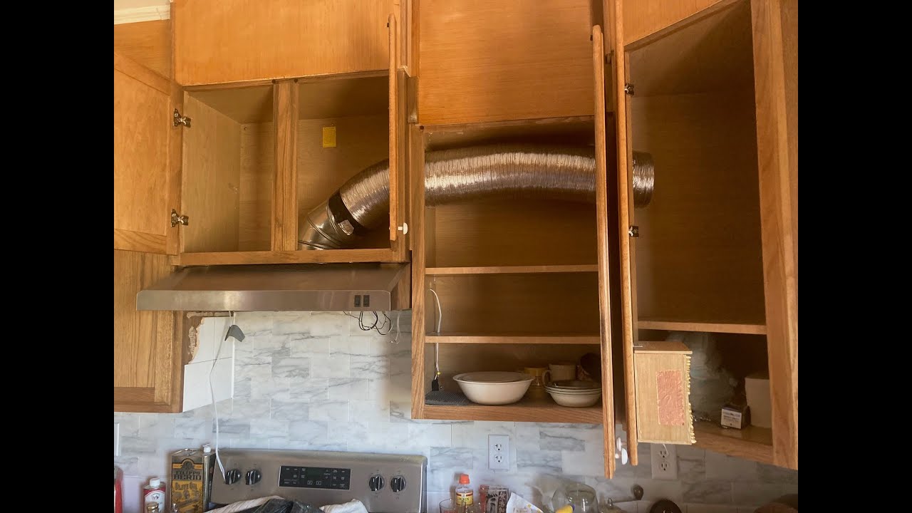 Kitchen Range Hood Converted From Inside Exhaust To Outside Exhaust. GE
