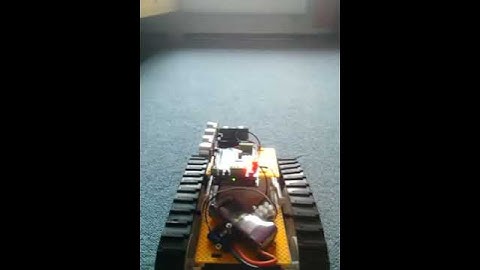 caterpillar robot with full speed, then full stop by ultrasonic distance sensor