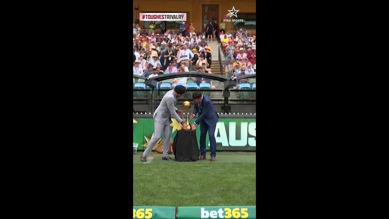 Harbhajan Singh & Ricky Ponting carry the BGT Trophy at Adelaide | 