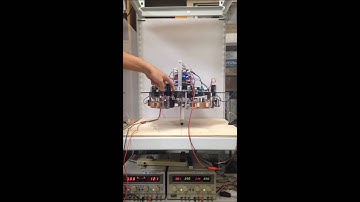 Balance Control of a Two-Dimensional Inverted Pendulum System Actuated by Control Moment Gyroscopes
