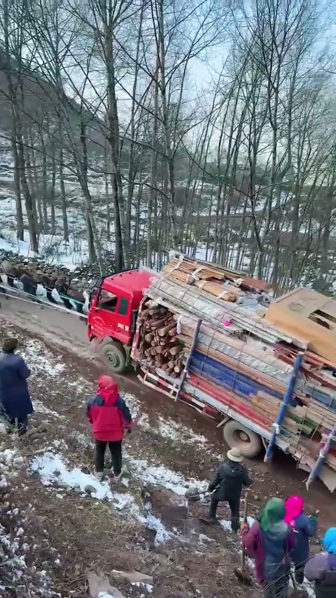 The process of pulling a truck up a steep slope