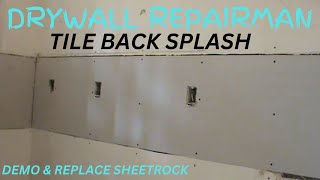 process of remodeling a kitchen removal of the old tile backsplash drywall installation