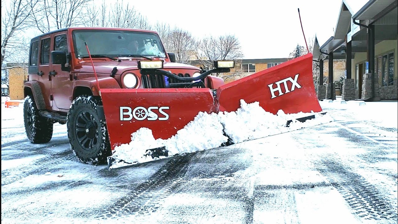 SNOW REMOVAL OF PARKING LOT WITH JEEP WRANGLER AND BOSS HTX V PLOW. -  YouTube